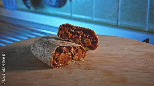 Spicy Chicken And Beans In Tortilla Wrap Ready To Eat. rack focus