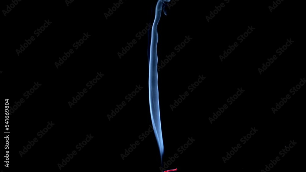 Real smoke on a black background. Thin Flexible Trickle of Real Smoke. Colorful real smoke slow motion rises up. Ideal for background or over-layer with blending mode add, screen, lighten. Real smoke on a black background. Thin Flexible Trickle of Real Smoke. Colorful real smoke slow motion rises up. Ideal for background or over-layer with blending mode add, screen, lighten.