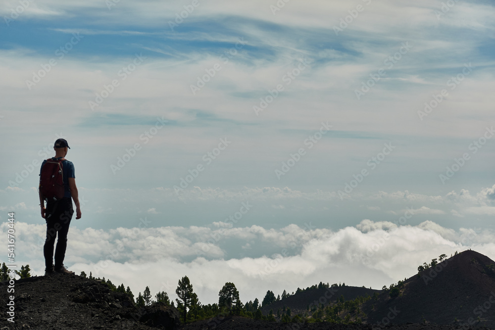 Obraz premium Seas of clouds, lava flows, the Teide of Tenerife in the background and many more spectacular landscapes on the route of the volcanoes (Cumbre Vieja) on the island of La Palma. Canary Islands. Spain