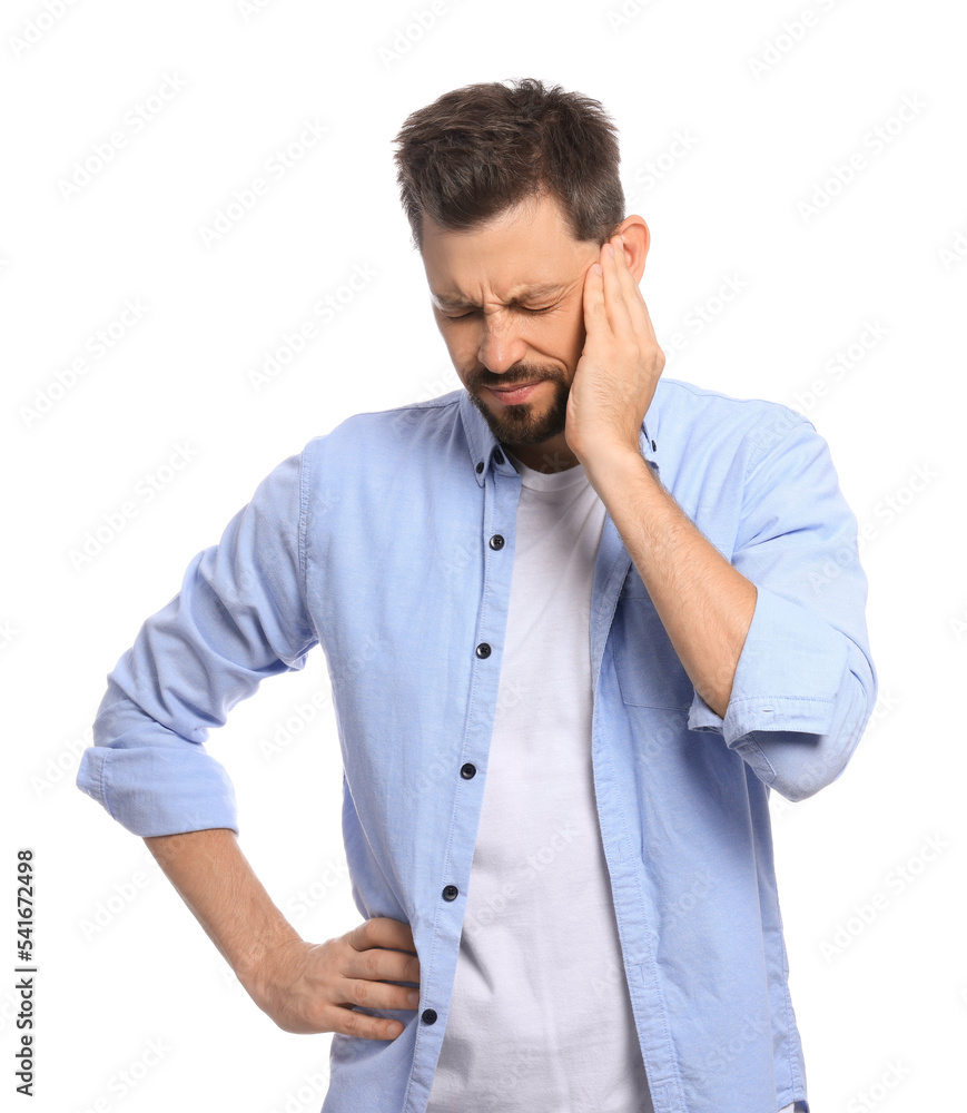 Man suffering from ear pain on white background Man suffering from ear pain on white background