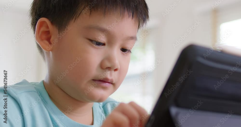 Cute asia people alpha Gen Z kid small boy happy play video game app online at home. Enjoy fun class little child care study learn upskill idea course look at touch screen smart tech digital tablet. Cute asia people alpha Gen Z kid small boy happy play video game app online at home. Enjoy fun class little child care study learn upskill idea course look at touch screen smart tech digital tablet.