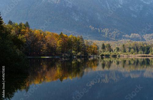 Lake Bohinj and Julian Alps in autumn, Slovenia, reflections in the water