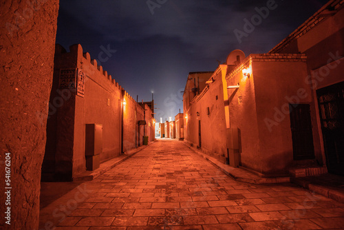 Schilderij op canvas An alley in the city citadel of Khiva at night.