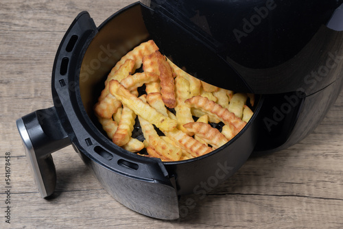 Air fried crinkle cut chips.