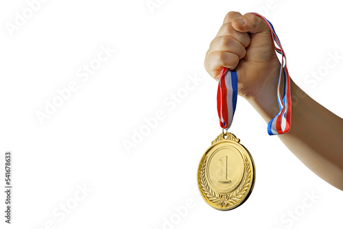 Foto woman hand raised, holding gold medal on isolated free PNG background award and
