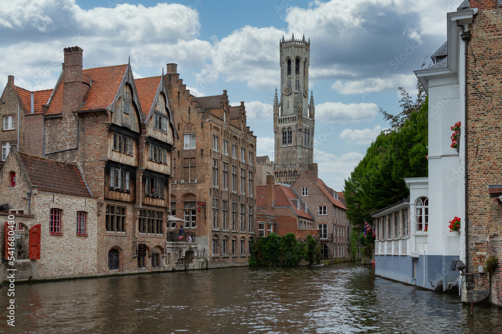 Some buildings of the city of Bruges in Belgium with Belfort and the canal