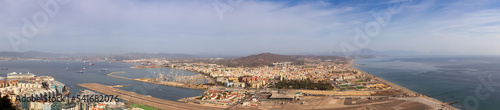 View of the City, Airport and Port from top of Rock of Gibraltar. Sunny Morning Sky. Gibraltar, United Kingdom. Panorama