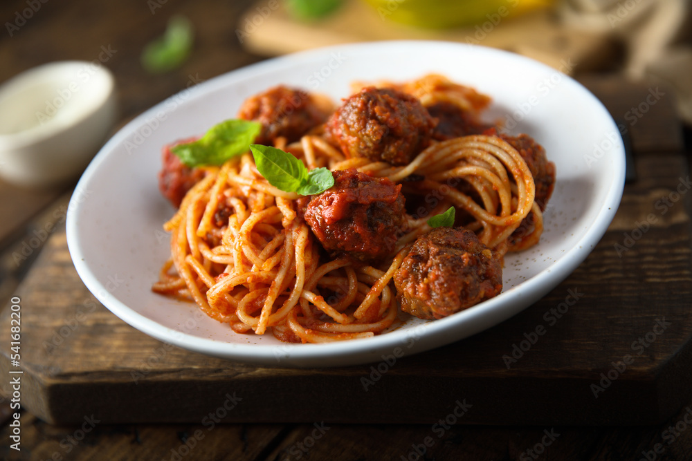 Traditional spaghetti with meatballs and tomato sauce Traditional spaghetti with meatballs and tomato sauce