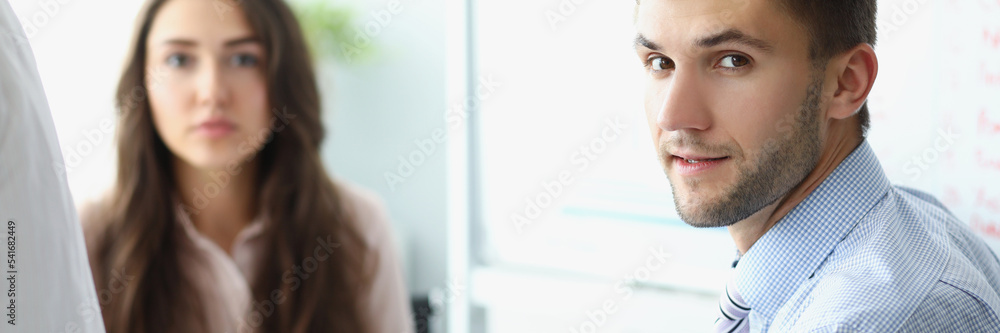 Man business employee on workplace, clerk look in camera on conference meeting Man business employee on workplace, clerk look in camera on conference meeting