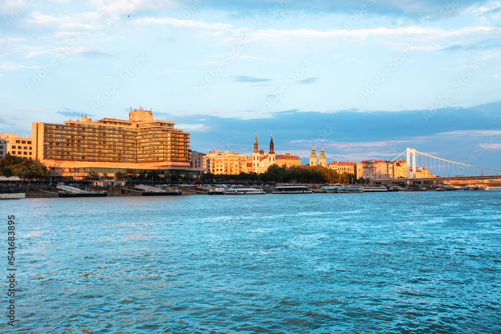 Panoramic view of Budapest from the river at sunset