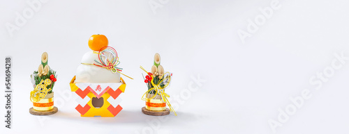 Japanese New Year. Kagami mochi and Kadomatsu on the white background. 日本のお正月。白背景上の鏡餅と門松。 © Kana Design Image