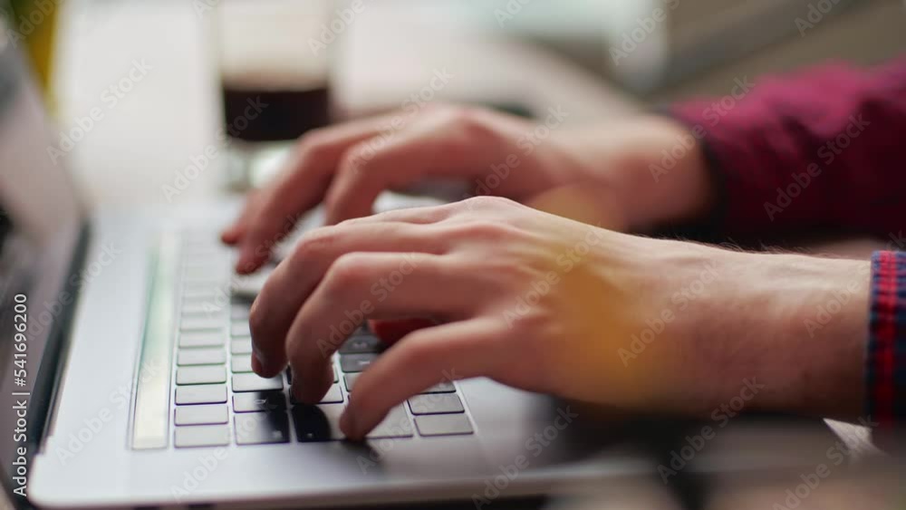 Close up of freelancer's developer hands typing program code on laptop keyboard in coworking. Businessman at work in working in office. Copywriter writing text on computer keyboard in coffeeshop. Close up of freelancer's developer hands typing program code on laptop keyboard in coworking. Businessman at work in working in office. Copywriter writing text on computer keyboard in coffeeshop.