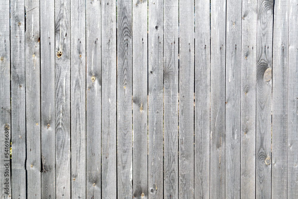 Background textured abstract vertical wooden fence palings. Background textured abstract vertical wooden fence palings.