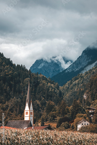 Wallpaper Mural church in the mountains with cloudy landscape Torontodigital.ca