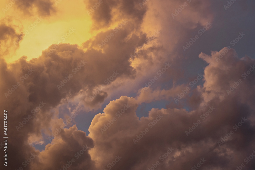 Dramatic cloudy sky during a red sunset Dramatic cloudy sky during a red sunset