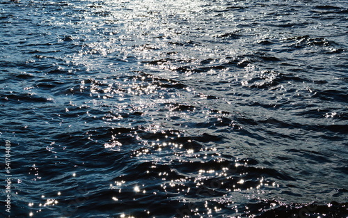Shimmering dark blue sea waves
