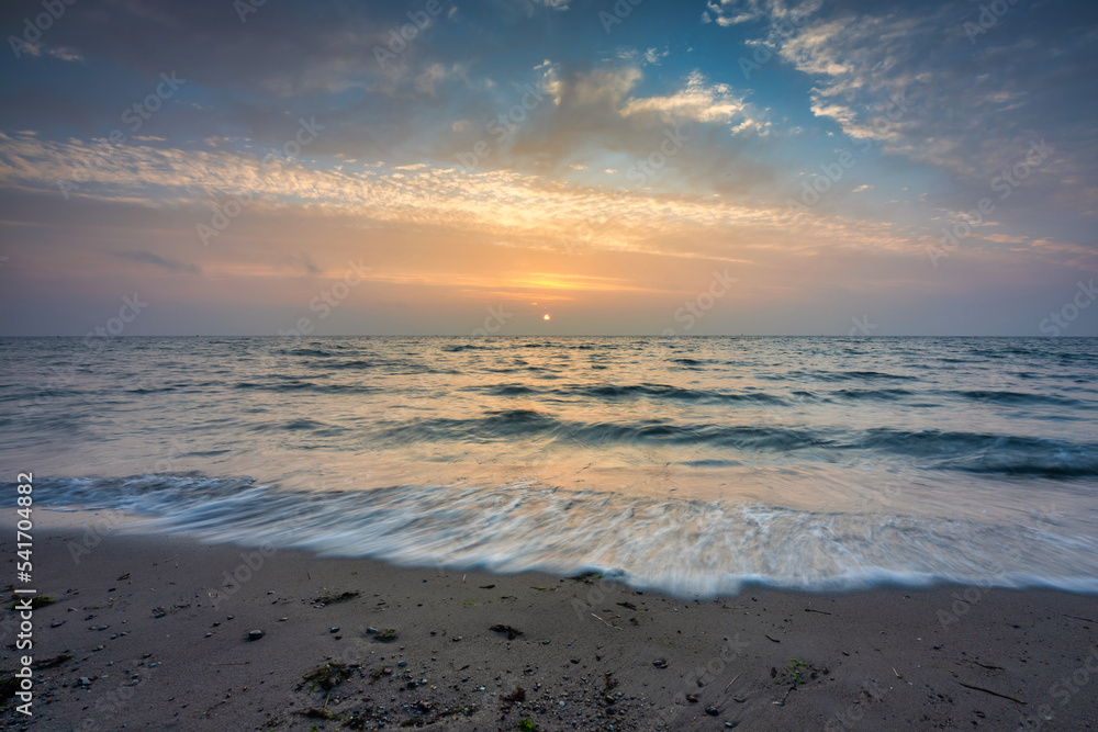 Baltic Sea beach in Gdynia Orlowo at sunrise, Poland