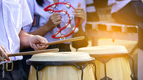 Tumba drums or Tumbadora drums are being played by students at the sport day                         