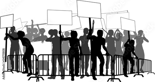 A silhouette crowd or group of people demonstrators at a protest, rally or strike with signs
