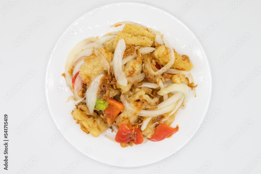 Chinese Style Salt and Pepper Squid with Onions and Green Peppers on a White Plate