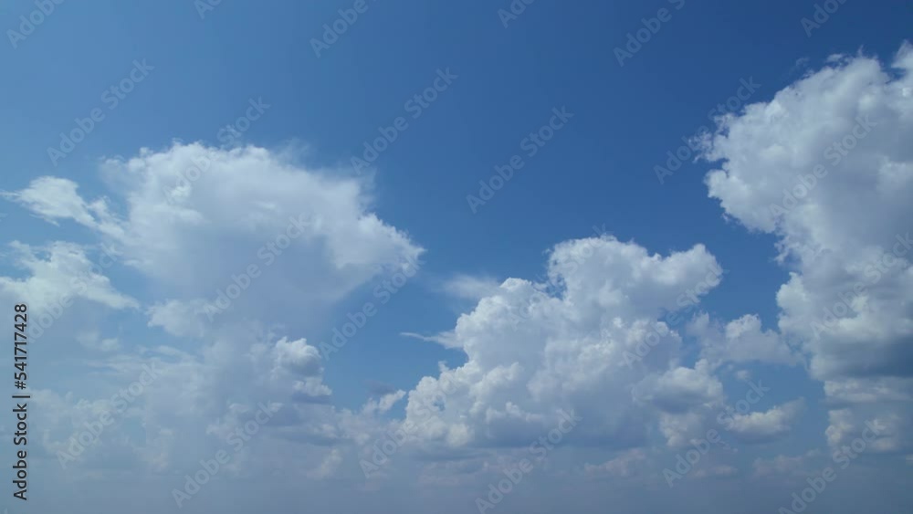 The sky is pure blue, with white cumulus clouds. On a bright, sunny day, an aerial perspective of the never-ending scenic skyscape. A colorful heaven with a fluffy cloudscape looks like paradise. The sky is pure blue, with white cumulus clouds. On a bright, sunny day, an aerial perspective of the never-ending scenic skyscape. A colorful heaven with a fluffy cloudscape looks like paradise.
