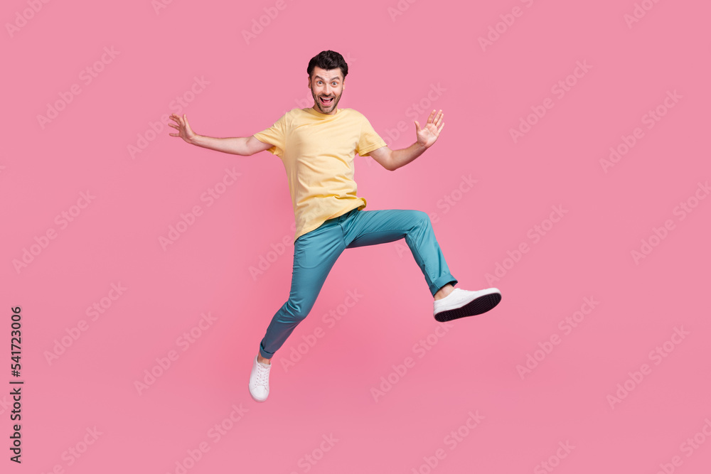 Full length photo of nice good mood boy wear comfort street outfit hurry black friday sale empty space isolated on pink color background