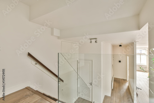 Interior of upper floor of modern house with staircase photo