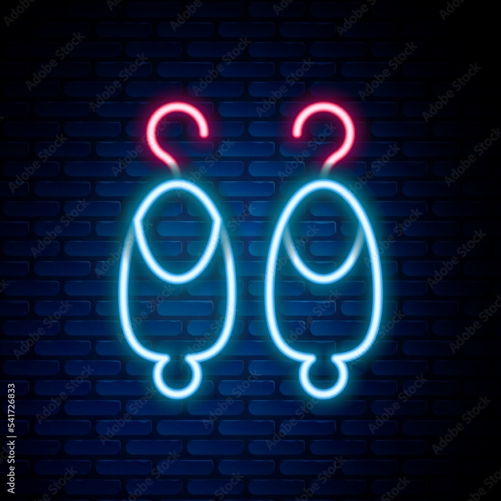 Glowing neon line Earrings icon isolated on brick wall background. Jewelry accessories. Colorful outline concept. Vector Glowing neon line Earrings icon isolated on brick wall background. Jewelry accessories. Colorful outline concept. Vector