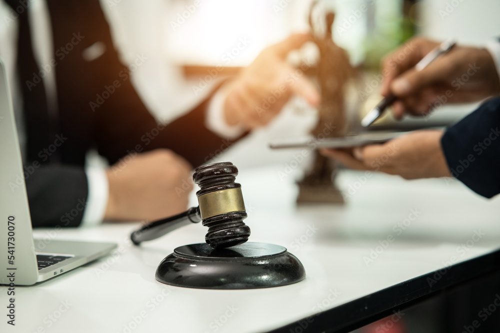 Judge gavel with Justice lawyers having team Concepts of Law and Legal services Judge gavel with Justice lawyers having team Concepts of Law and Legal services