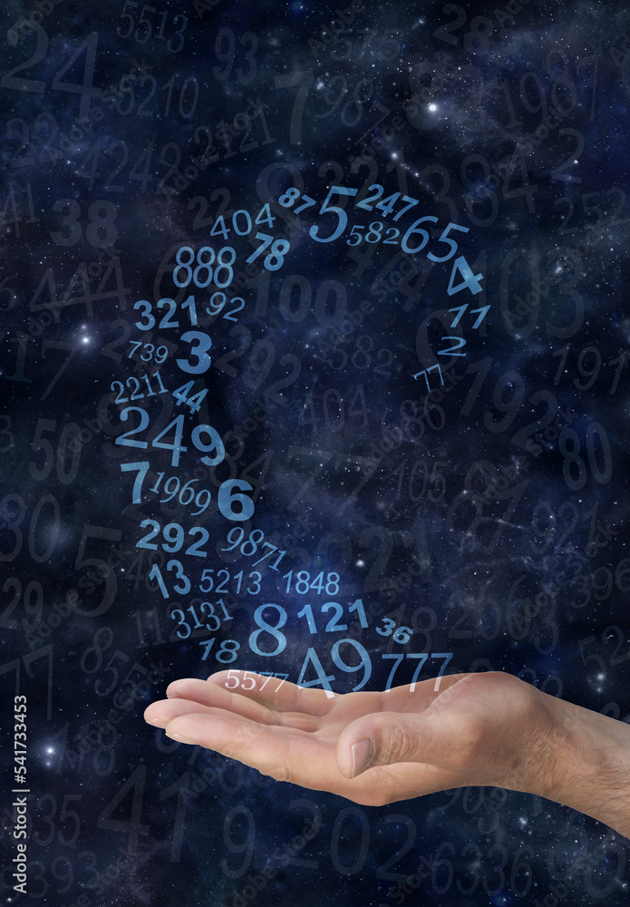 Numerologist working with numbers - male hand with a spiral of random ...