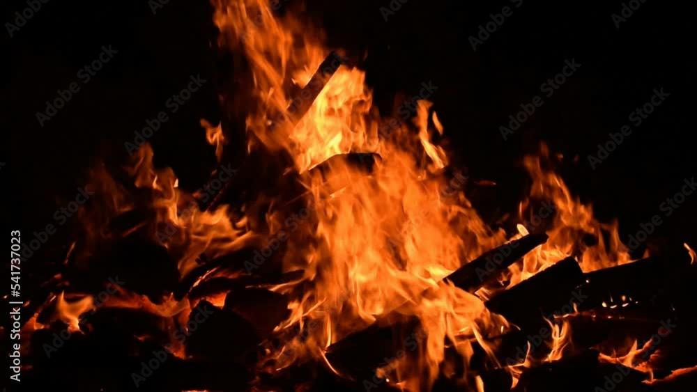 Fire flames on black background, Blaze fire flame texture background, Beautifully, the fire is burning, Fire flames with wood and cow dung bonfire Fire flames on black background, Blaze fire flame texture background, Beautifully, the fire is burning, Fire flames with wood and cow dung bonfire