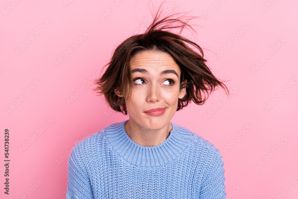 Portrait of minded positive girl look interested empty space isolated on pink color background Portrait of minded positive girl look interested empty space isolated on pink color background