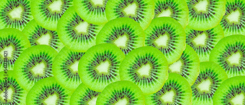 Kiwi slices pattern background. Healthy fruits. Web banner.