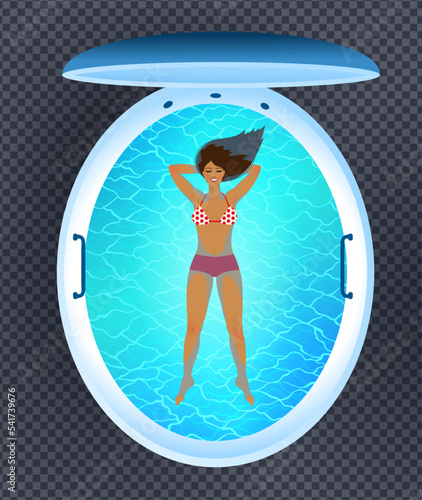 Young woman resting in floating tank capsule