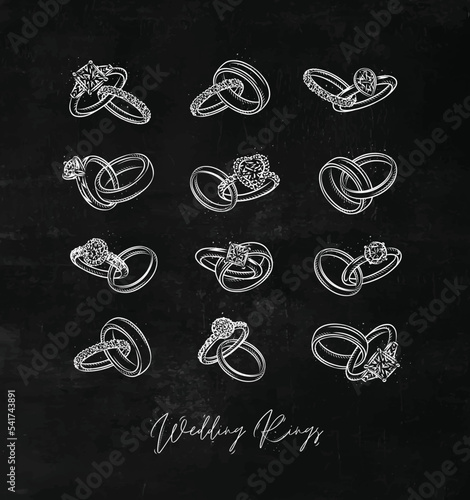 Wedding and engagement ring drawing in vintage graphic style on chalkboard background
