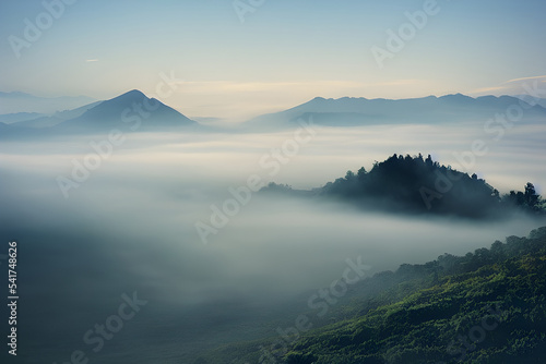 Mountains and valley blanketed in thick fog. 