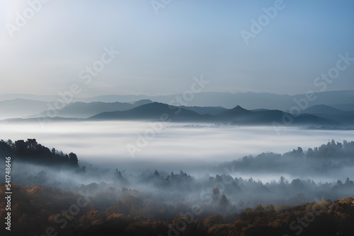Mountains and valley blanketed in thick fog. © ECrafts