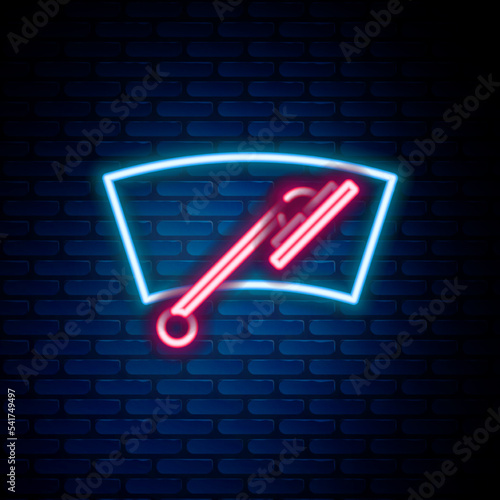 Glowing neon line Windscreen wiper icon isolated on brick wall background. Colorful outline concept. Vector