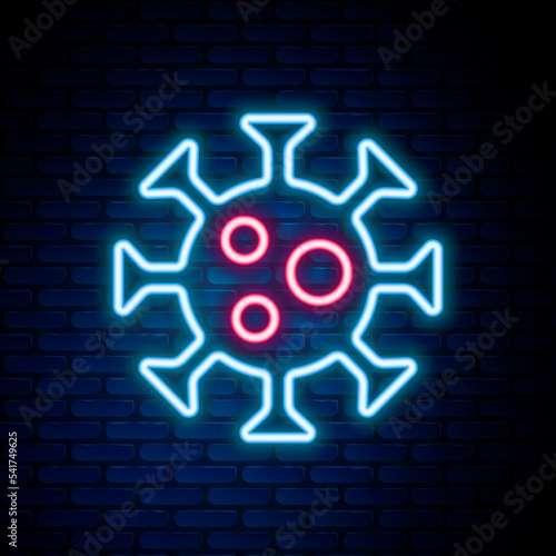 Glowing neon line Virus icon isolated on brick wall background. Corona virus 2019-nCoV. Bacteria and germs, cell cancer, microbe, fungi. Colorful outline concept. Vector