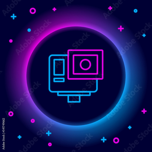 Glowing neon line Action extreme camera icon isolated on black background. Video camera equipment for filming extreme sports. Colorful outline concept. Vector