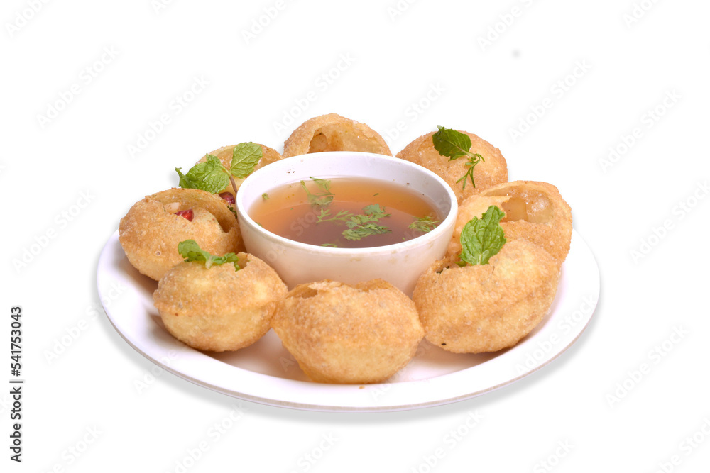 Delicious north and south indian street food pani puri gol gappa with tamarind water served in white plate and potato and chickpeas for food photography - obrazy, fototapety, plakaty 