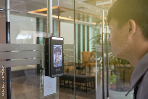 Biometric admittance control device for security system. Access control facial recognition system. Selective focus