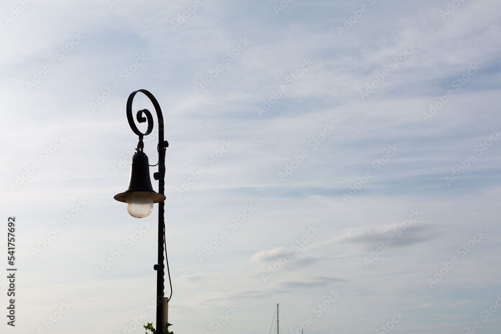 Wrought iron street lamp very typical in the towns and cities of Catalonia. Wrought iron street lamp very typical in the towns and cities of Catalonia.