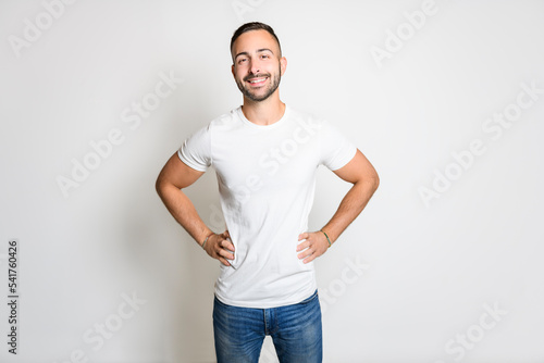 portrait of handsome young man. Cheerful men isolated on gray background studio shot