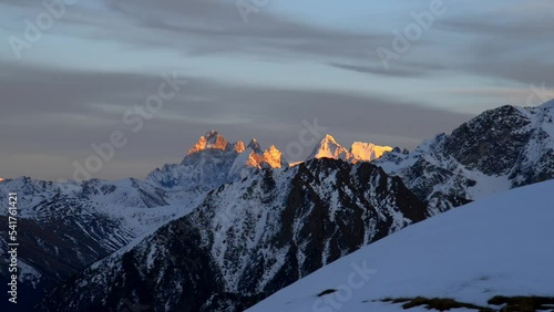 Mountain view, sunlit mountain tops in the evening at sunset