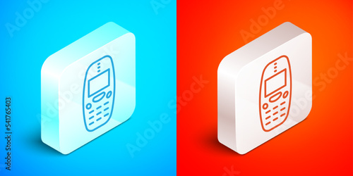 Isometric line Old vintage keypad mobile phone icon isolated on blue and red background. Retro cellphone device. Vintage 90s mobile phone. Silver square button. Vector