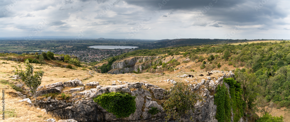 panorama landscape view of Cheddar Gorge in the Mendip Hills near Cheddar in Somerset panorama landscape view of Cheddar Gorge in the Mendip Hills near Cheddar in Somerset