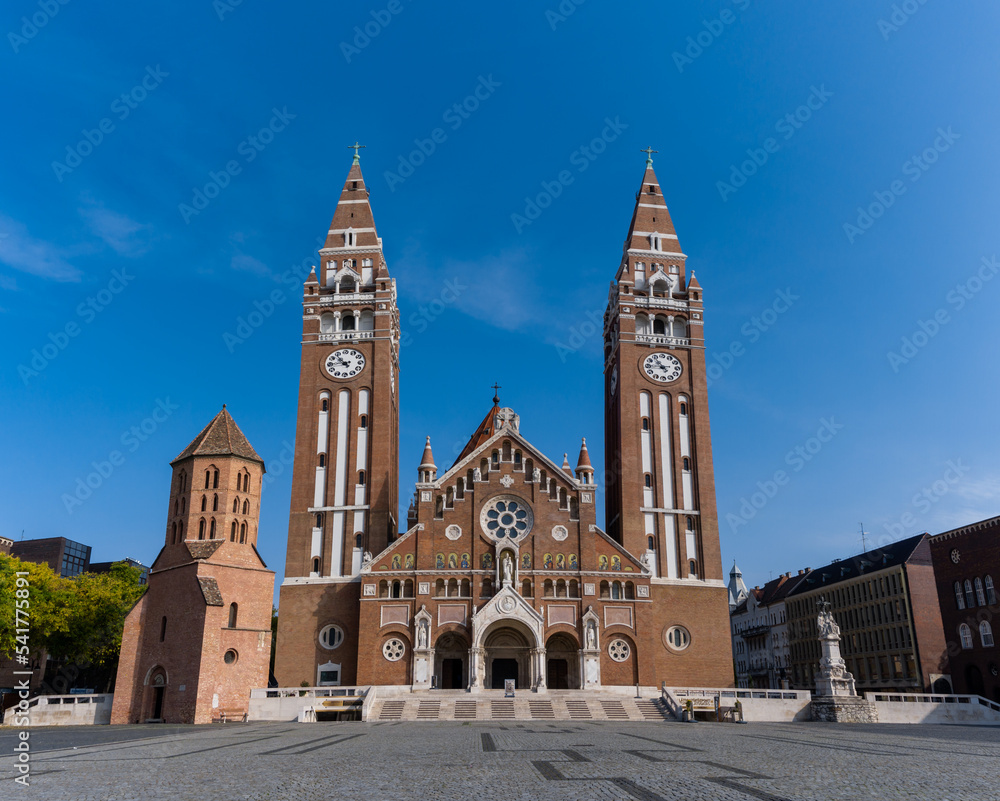 view of the twin-spire Roman Catholic Votive Church in Szeged