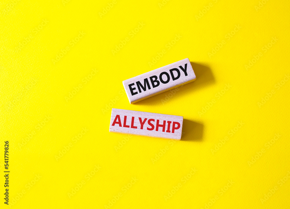 Embody Allyship symbol. Concept word Embody Allyship on wooden blocks. Beautiful yellow background. Business and Embody Allyship concept. Copy space Embody Allyship symbol. Concept word Embody Allyship on wooden blocks. Beautiful yellow background. Business and Embody Allyship concept. Copy space