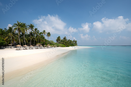 Turquoise water and sandy beach at a resort in Noonu Atoll, Maldives © Colin Godfrey